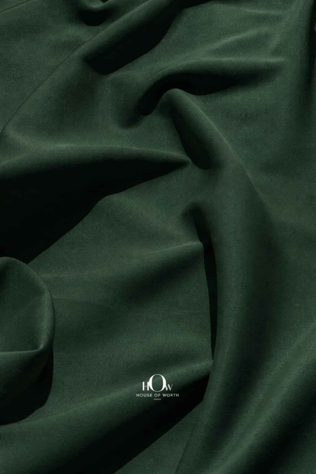 Plain bottle green banana crepe fabric by metre for boutique collections and export wear