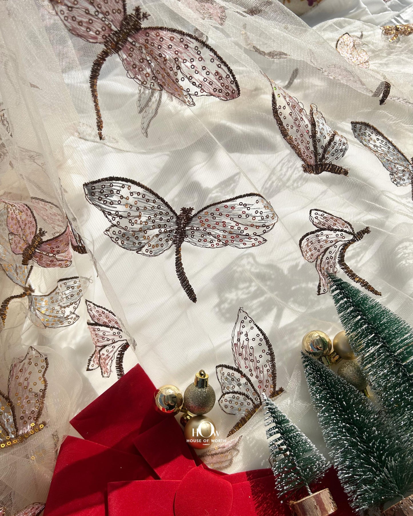 Festive embroidered fabric for partywear gowns – wholesale in Surat & Delhi.