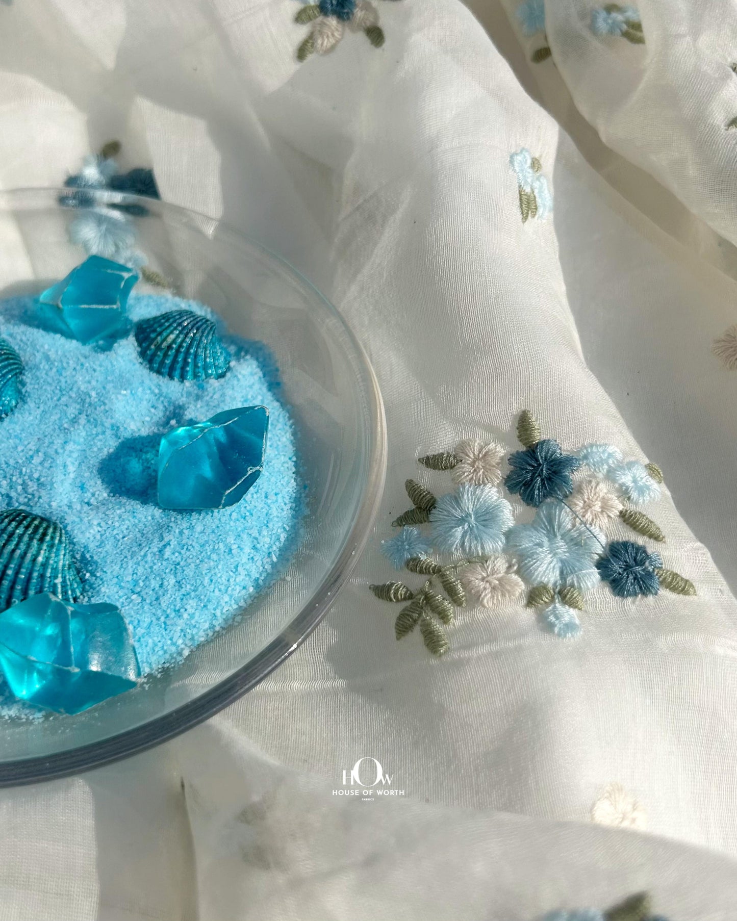 Off-white pure Mul Chanderi dress material with embroidered floral motifs – soft, breathable, and suitable for custom dyeing.