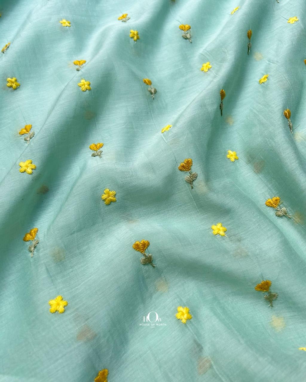 Pastel aqua floral embroidered chanderi fabric for elegant summer kurtas.