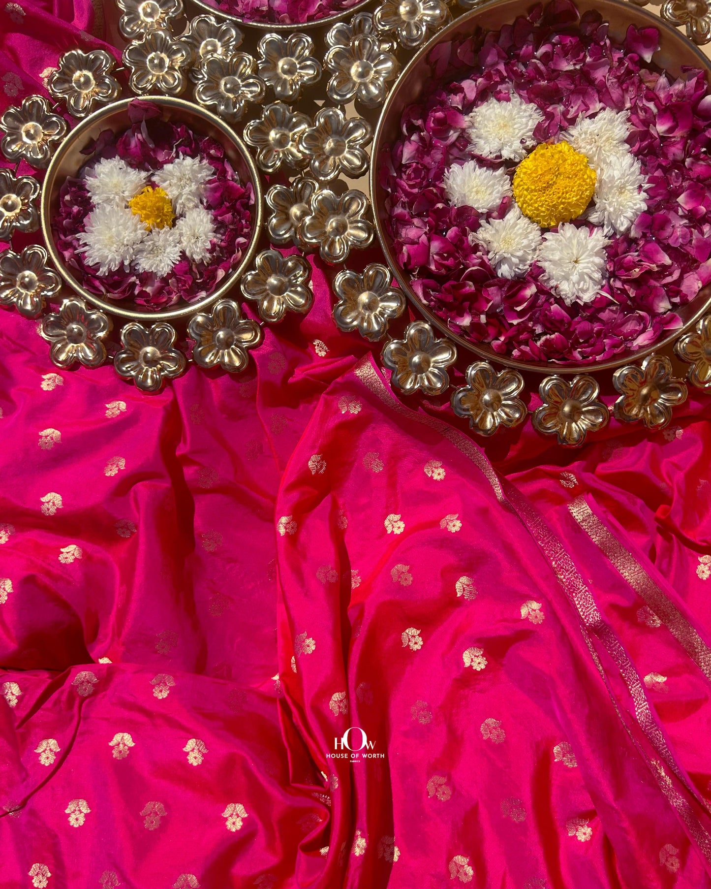 Pure Banarasi silk bridal saree from Varanasi with gold zari work and traditional motifs.