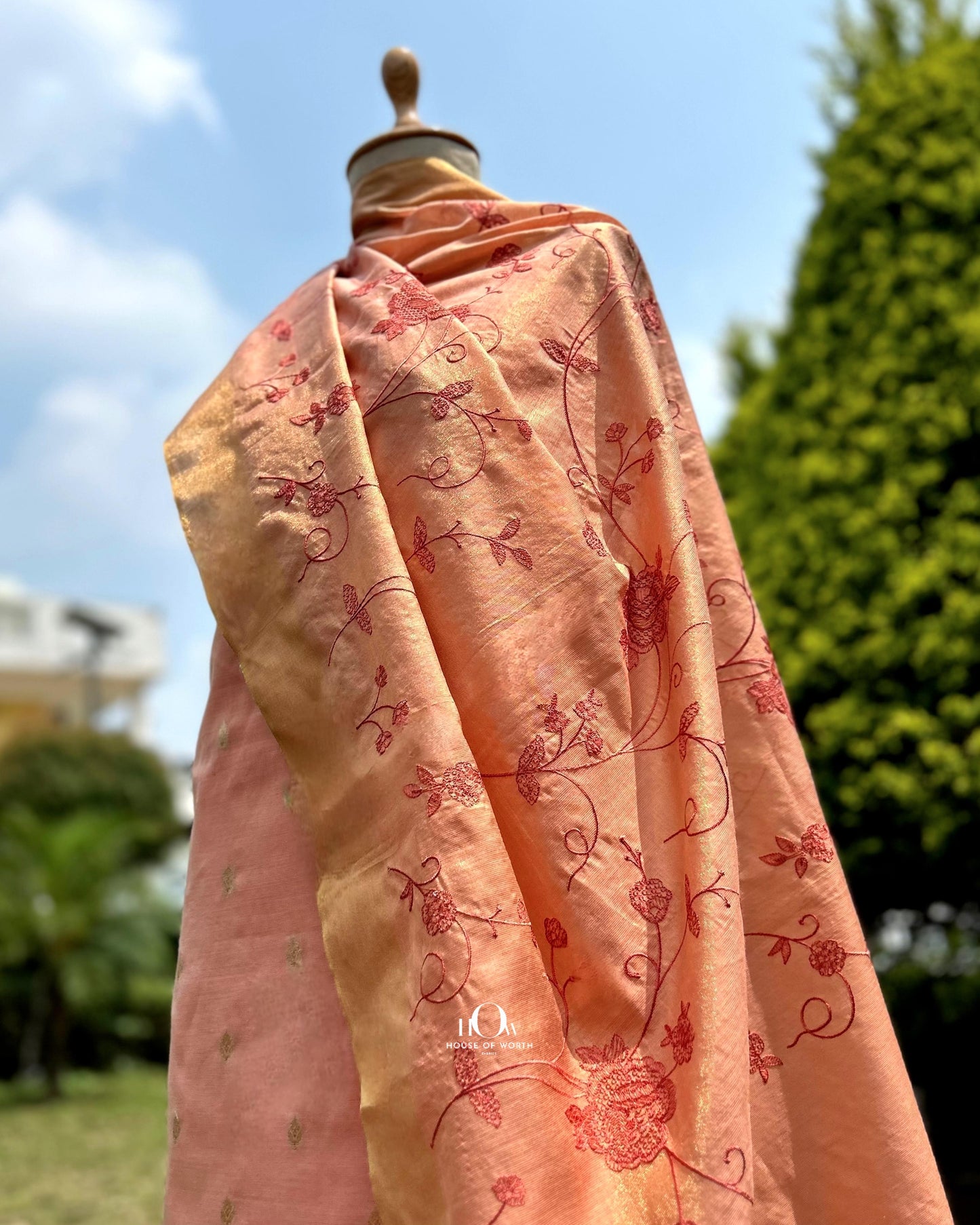 cotton tissue suit set with matching dupatta and bottom.