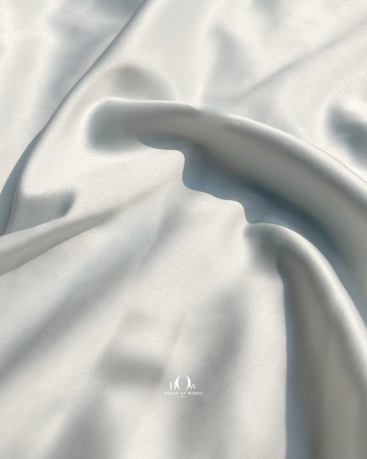 China-origin stretch satin under 100 gsm – perfect for evening wear, supplied in Surat.