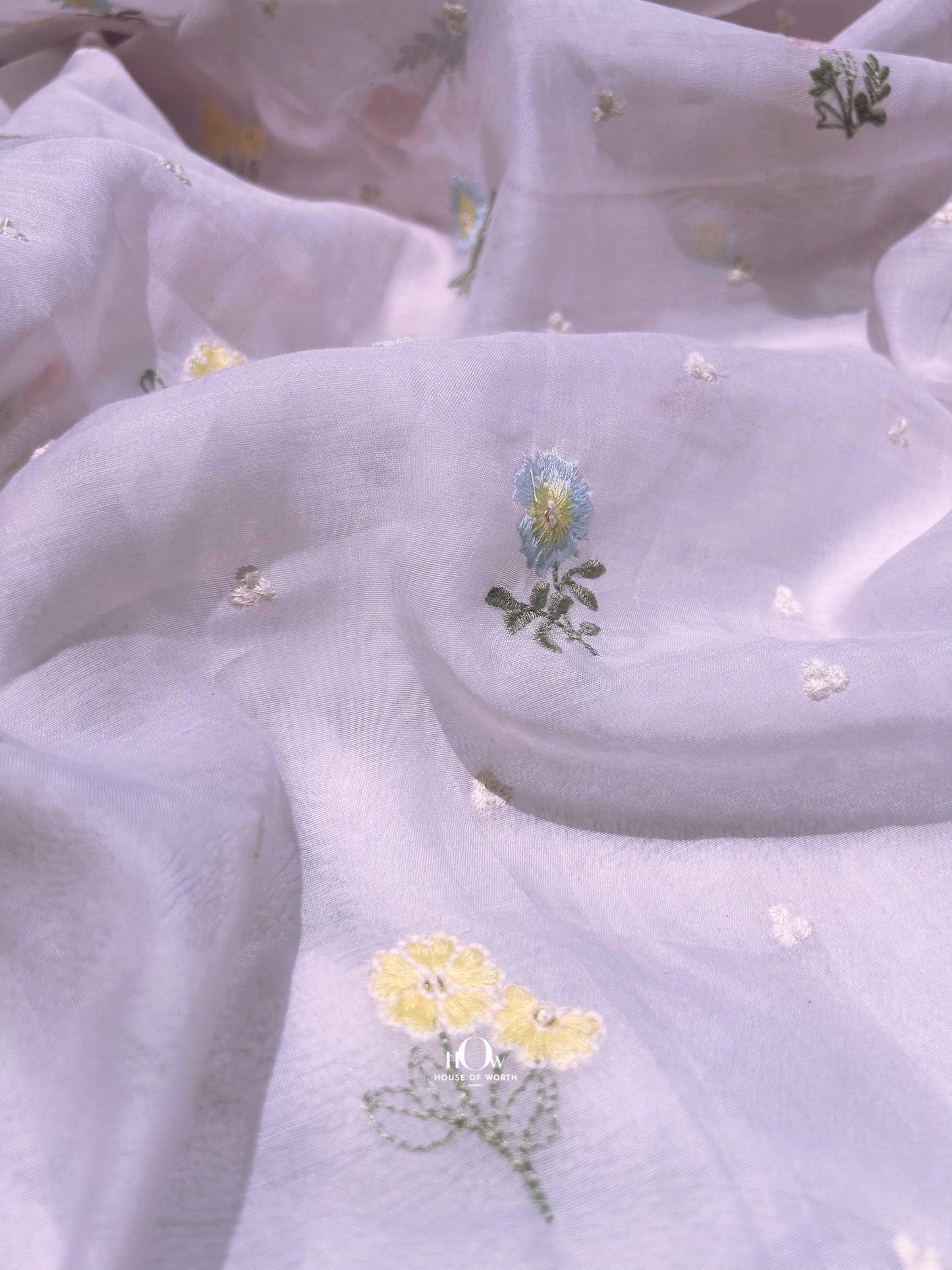 Mul Chanderi fabric for suits and sarees – pastel embroidered fabric available for bulk orders from Delhi, Surat, and Banaras.