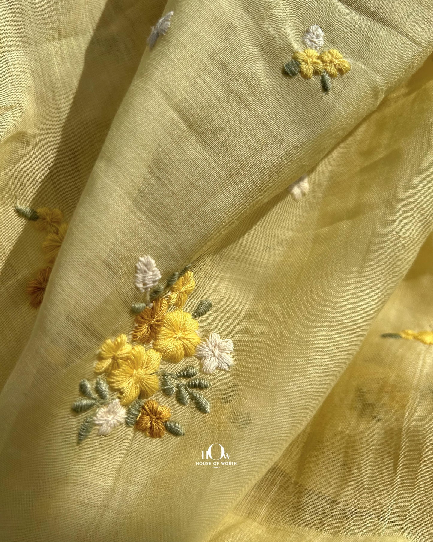 Floral embroidered yellow Chanderi fabric – premium quality available from fabric suppliers in Banaras, Surat, and Delhi