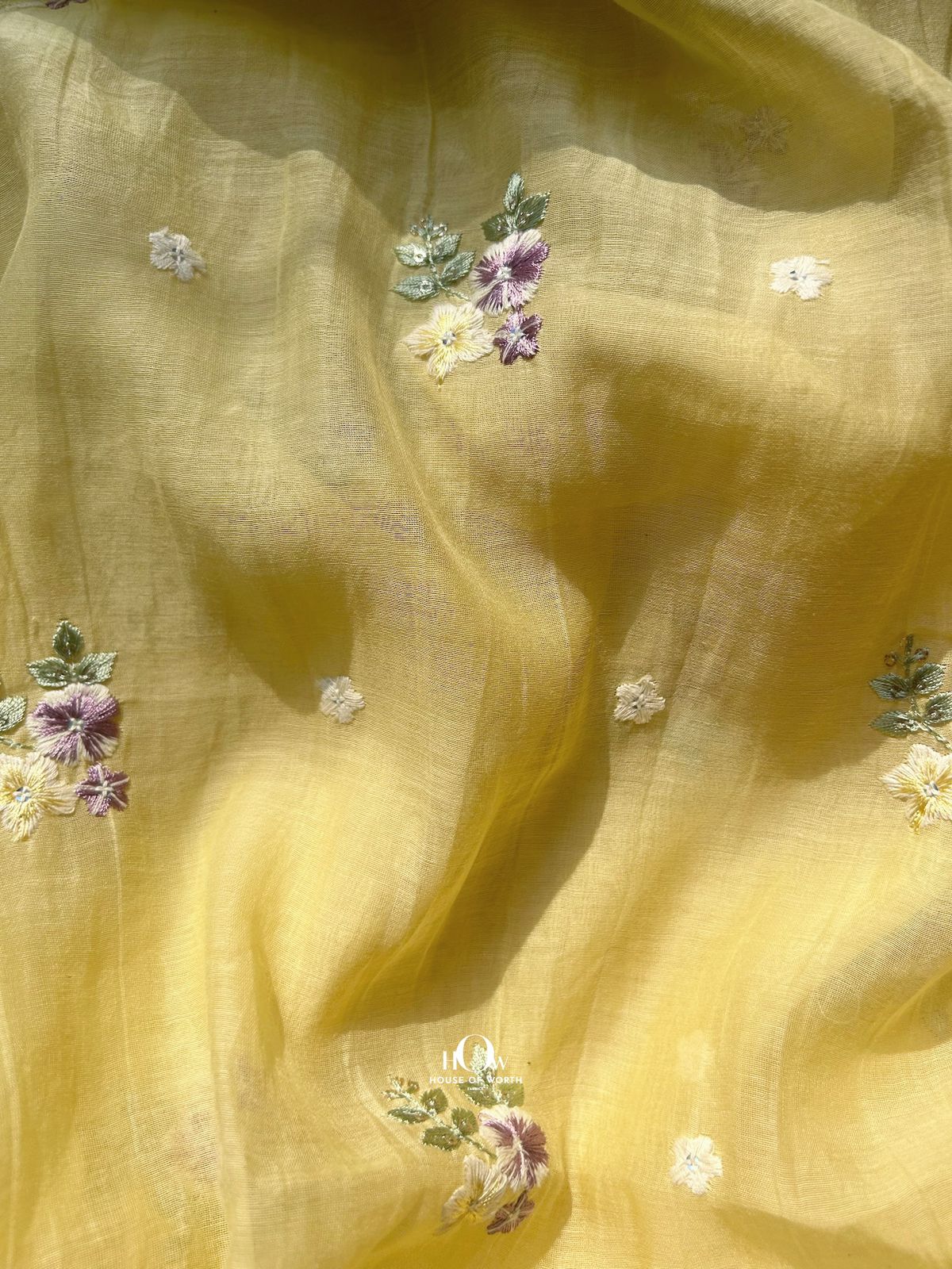 Buy yellow embroidered Mul Chanderi dress material in bulk – soft texture and floral threadwork ideal for ethnic collections.