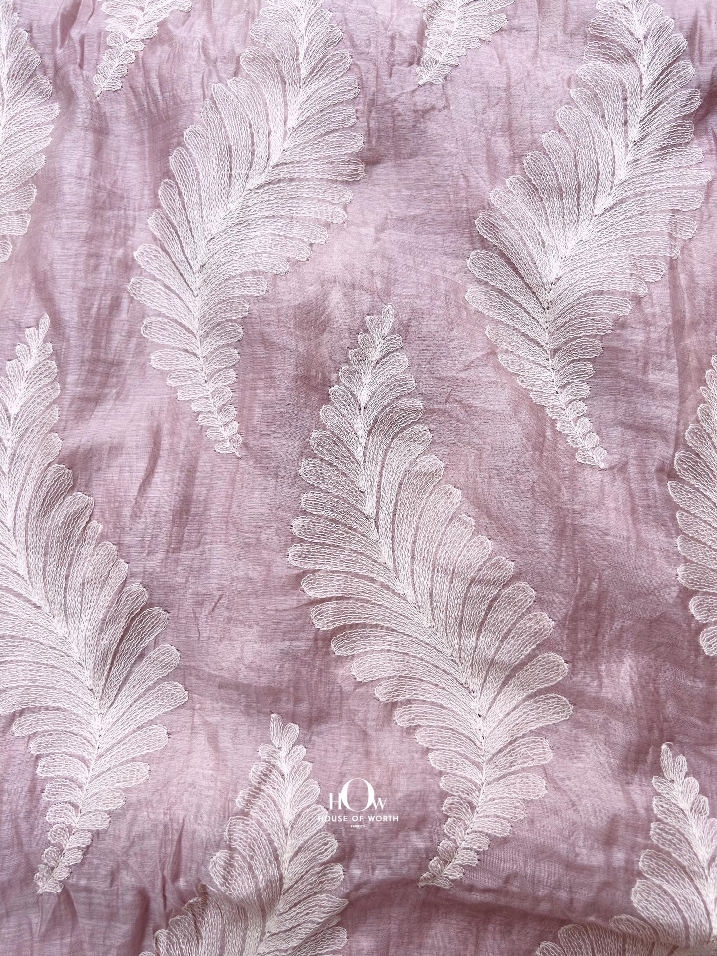 Buy jacquard textured Mul Chanderi fabric in soft pink – elegant tone-on-tone design for boutiques and ethnic collections.