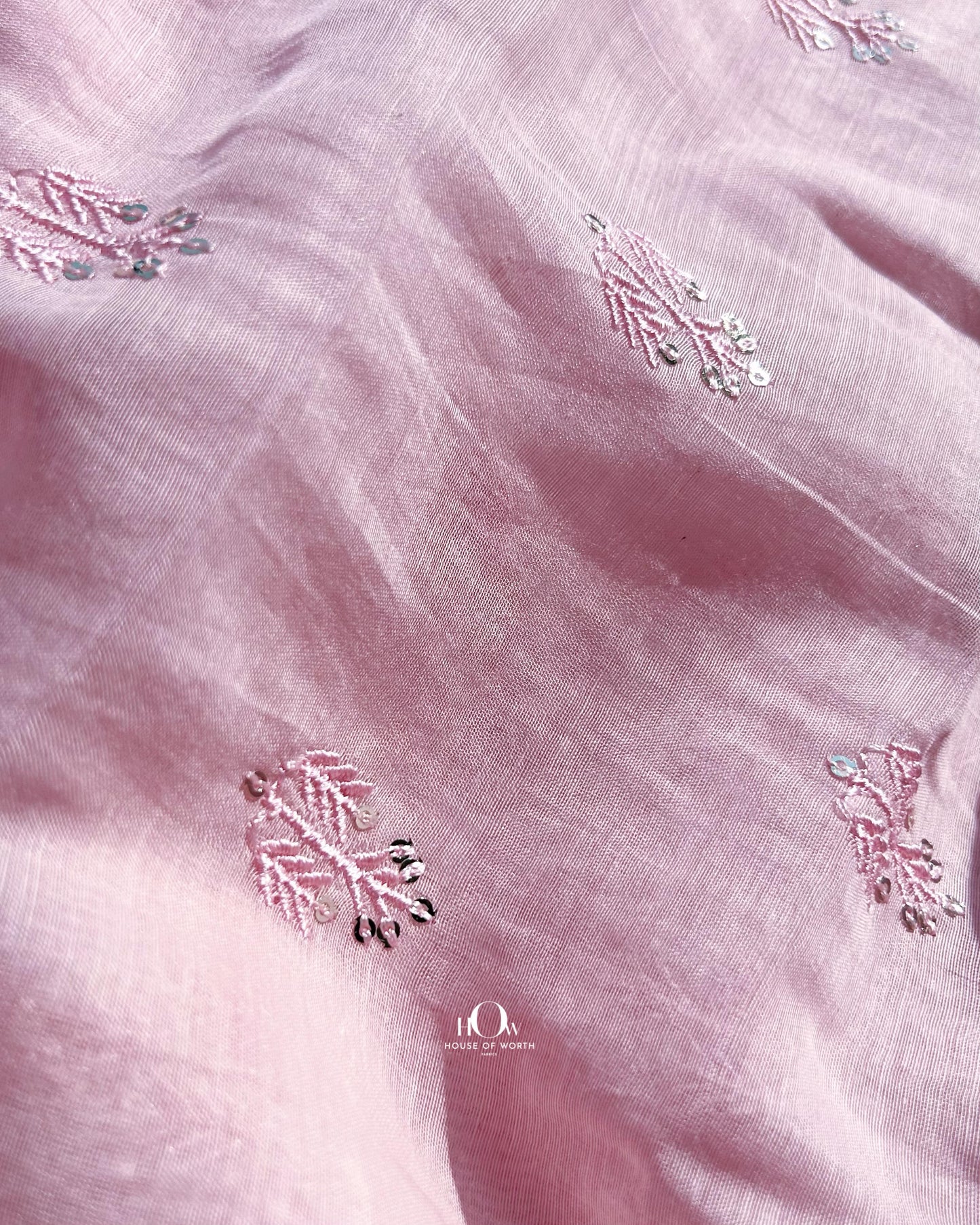 Wholesale supplier of Mul Chanderi fabric – soft embroidered dress material with subtle sparkle for ethnic tailoring.