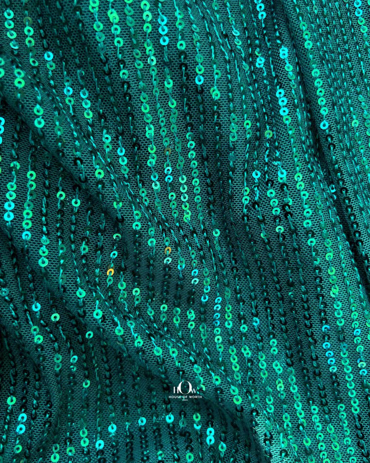 Green sequin fabric for stagewear and bridal wear – buy from fabric wholesalers in India.