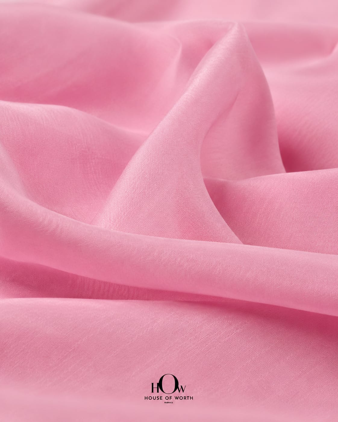 Light pink chanderi fabric close up with soft luxurious texture and breathable weave