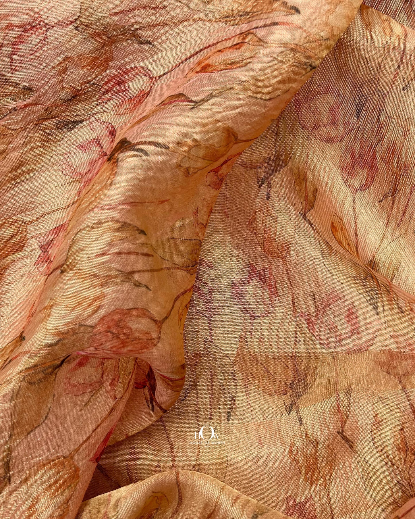 Rich crimson Banaras crushed tissue silk saree with intricate zari for traditional wear.
