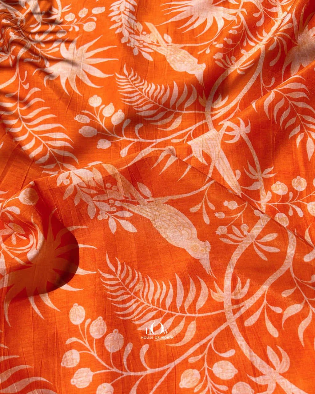 Orange printed Mul Chanderi fabric – flowy and lightweight for traditional ethnic styles.