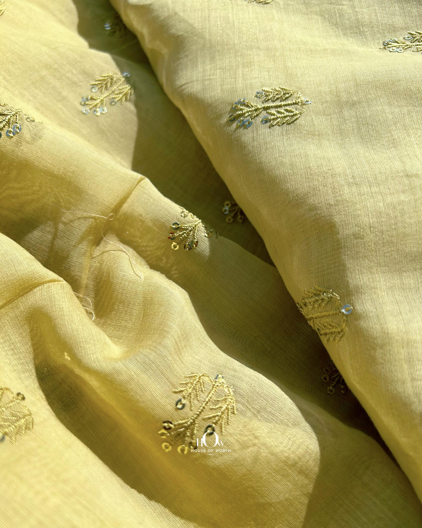 Premium-quality Mul Chanderi dress material in yellow – embroidered fabric available in Delhi, Banaras, and Surat.