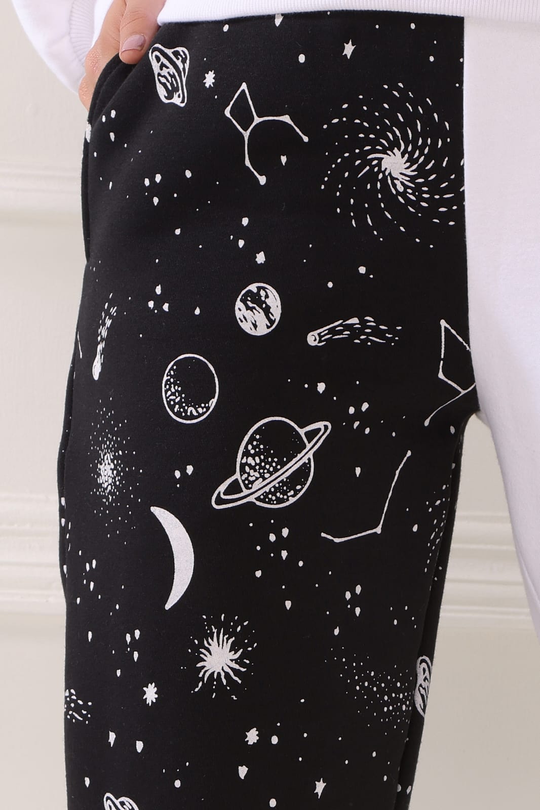 Stylish women’s black white baggy sweatpants with universe print for everyday wear