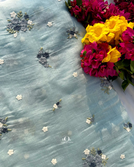 Mul Chanderi fabric with small butti embroidery – soft and elegant for suits, sarees, and festive wear.