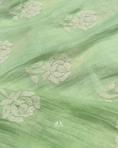 Lightweight handwoven green Mul Chanderi fabric – embroidered textile for premium Indian outfits.