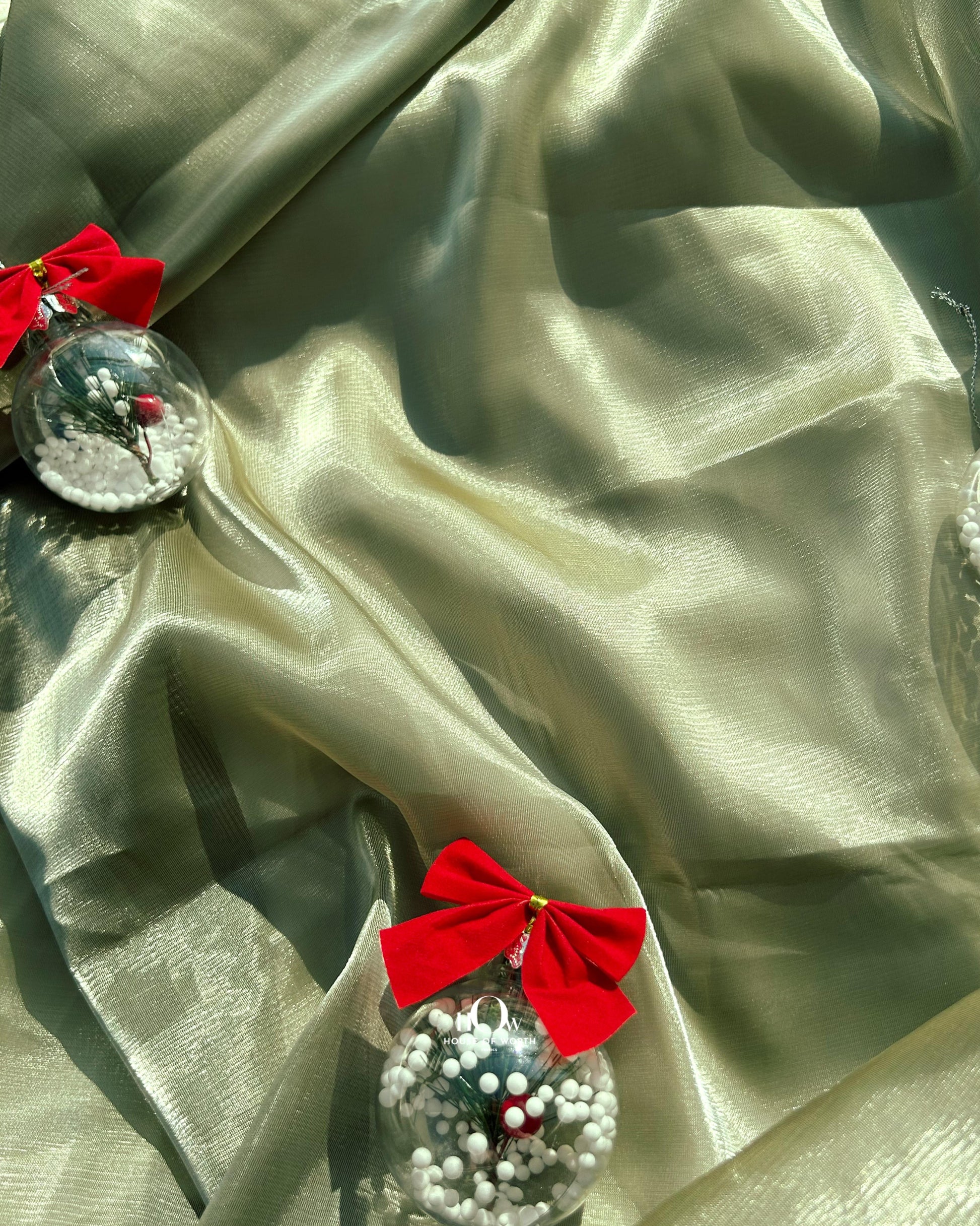 Glossy glass organza for cape gowns and structured dupattas – available from Delhi fabric dealers.