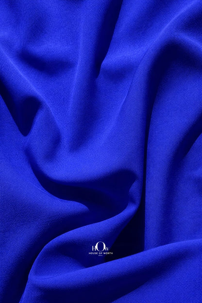 Royal blue banana crepe fabric close-up showing premium heavy crepe texture and rich colour