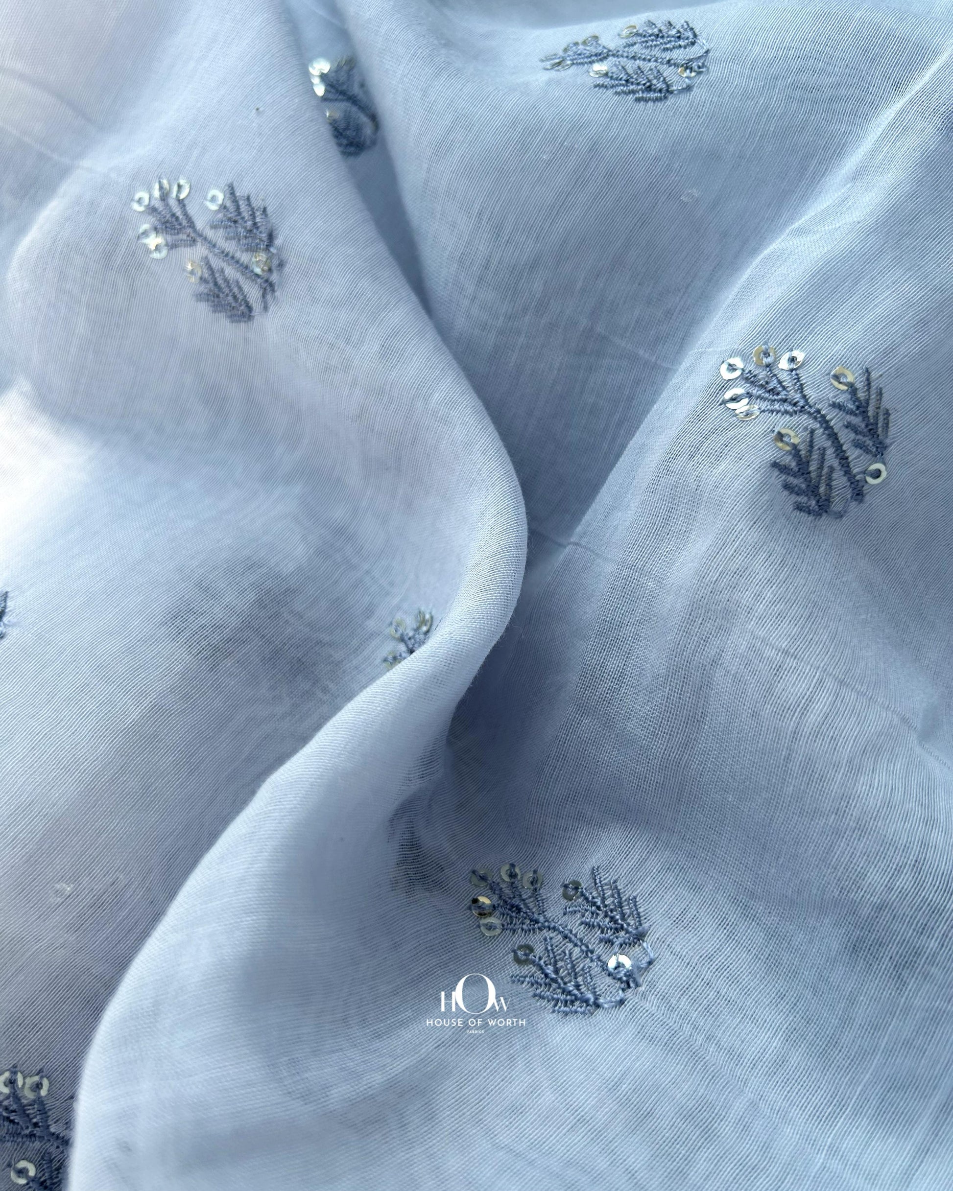 Buy light blue embroidered Chanderi fabric in bulk – subtle handloom texture ideal for tailoring and boutiques.