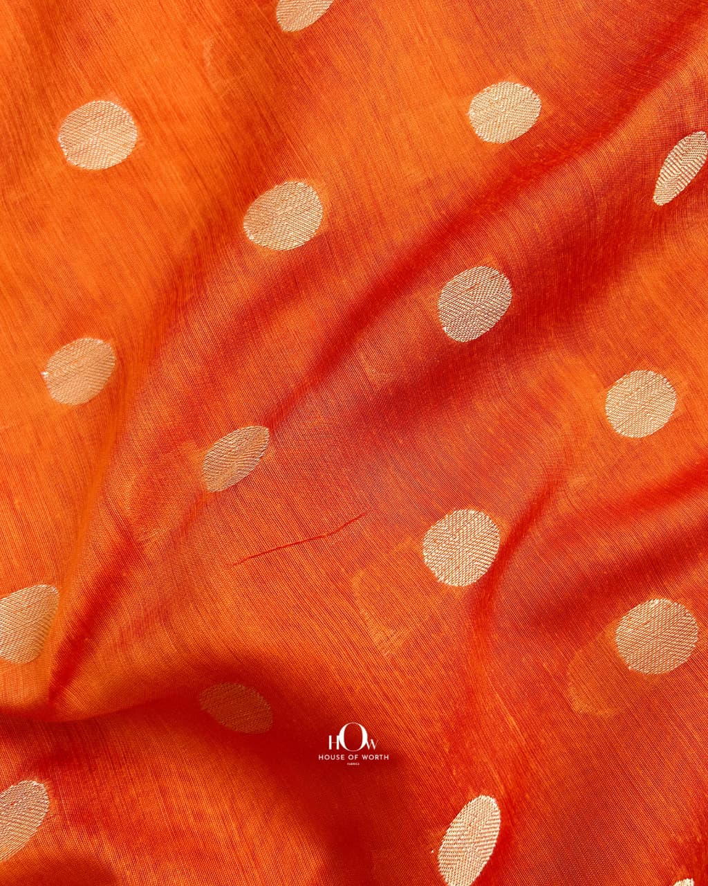Breathable cotton chanderi fabric in soft orange shade