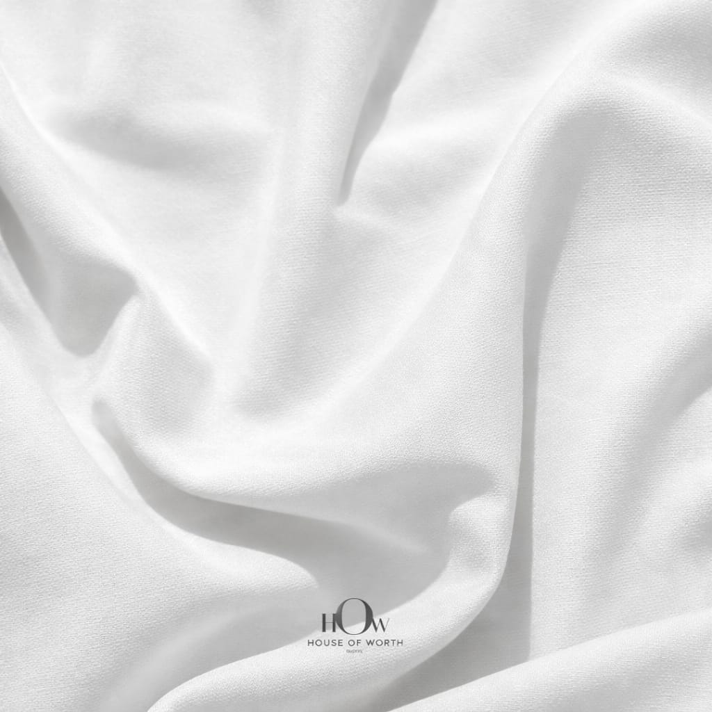 White imported banana crepe fabric with smooth finish for dresses, skirts and gowns
