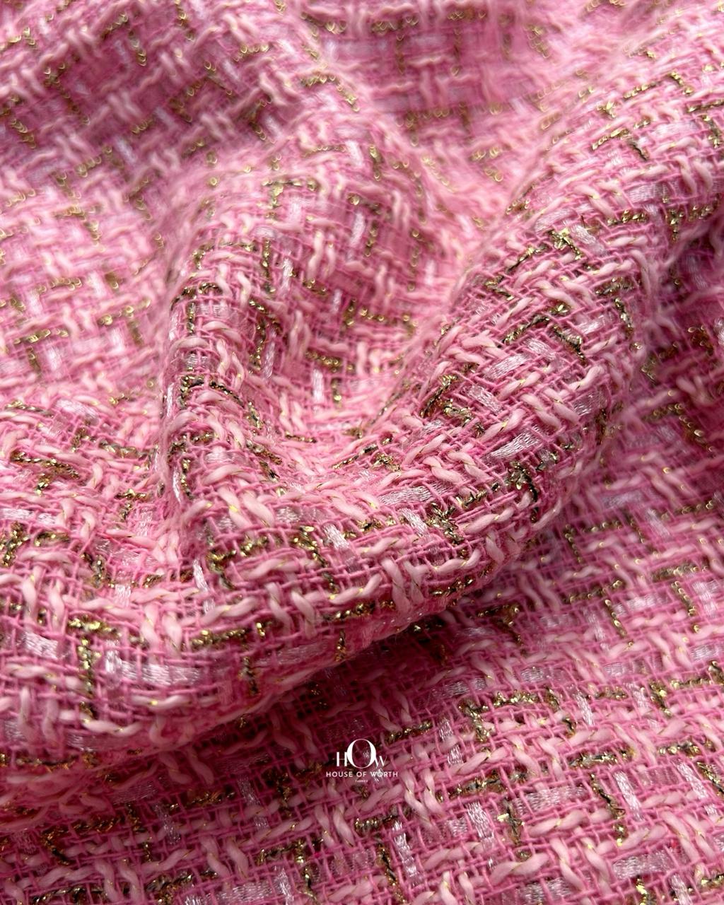 Imported pink tweed fabric.