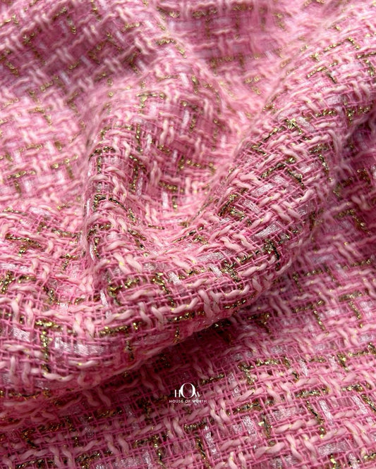Imported pink tweed fabric.