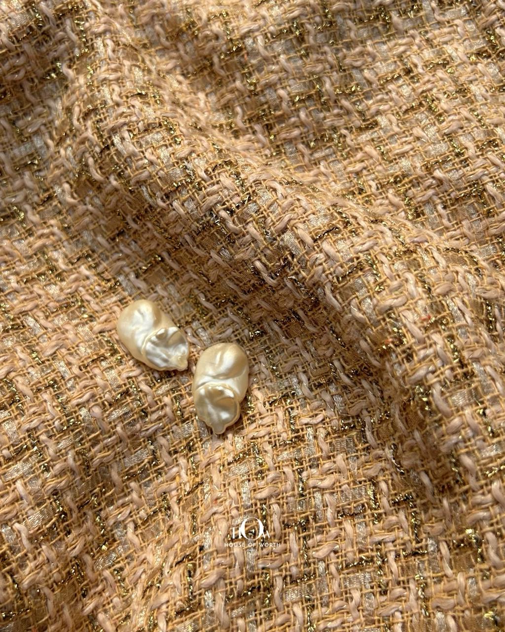 Imported tweed fabrics for blazers and garments.