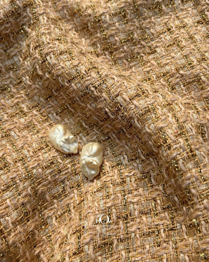 Imported tweed fabrics for blazers and garments.