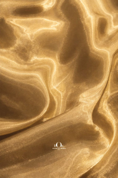 Light golden imported glass organza fabric with luxurious shine