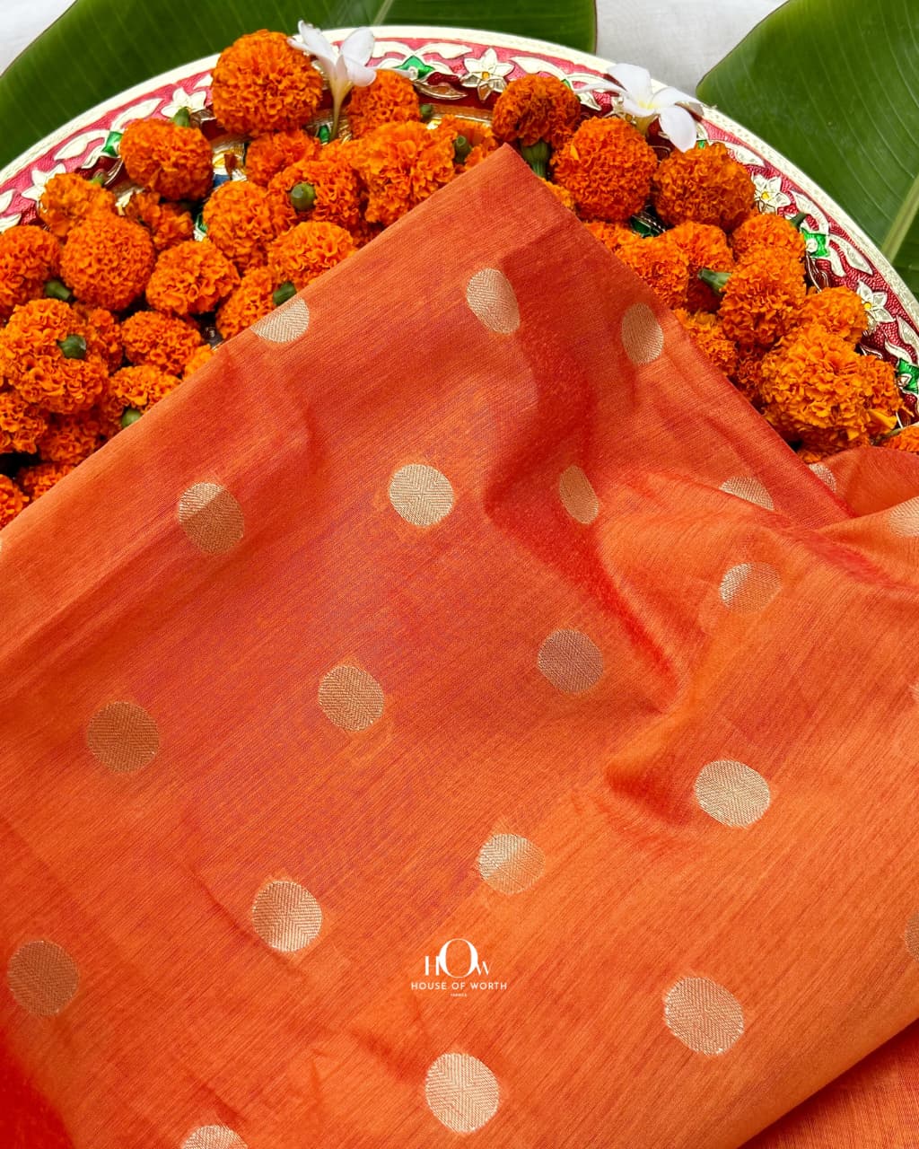 Light orange pure cotton chanderi fabric with woven polka dots