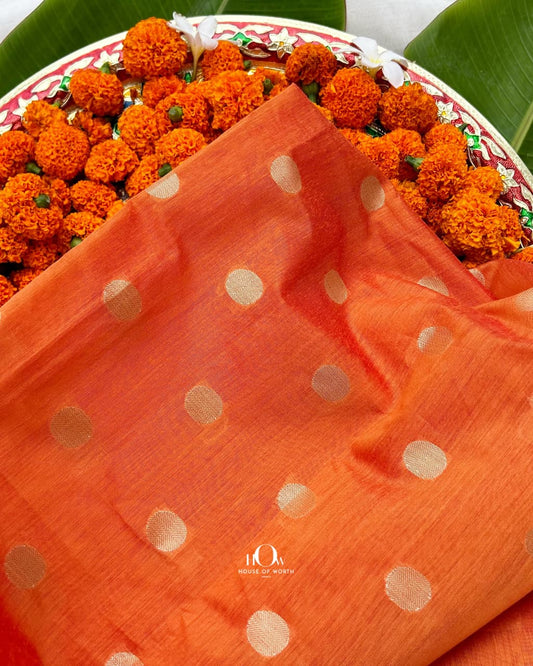 Light orange pure cotton chanderi fabric with woven polka dots