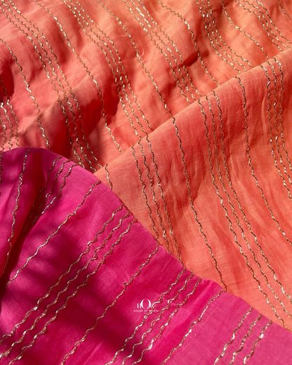 Rani Pink ombre chanderi fabric with metallic zari weave and rich coral-to-pink gradient for luxury attire