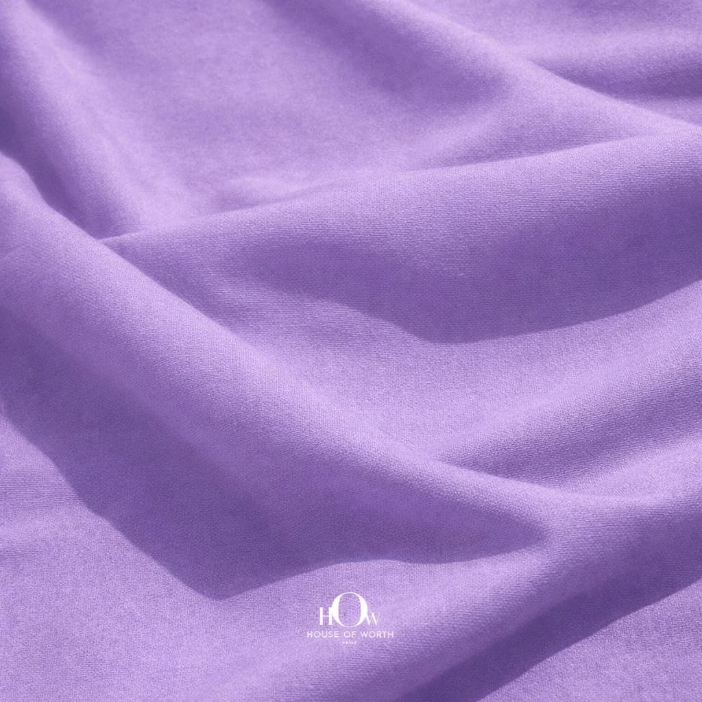 Close-up lilac banana crepe texture, premium heavy crepe fabric for gowns and designer outfits