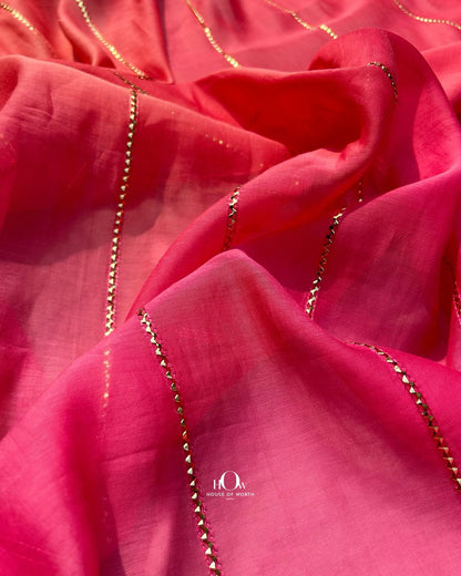 Soft breathable Mul Chanderi fabric in pink orange shade perfect for couture and export garments