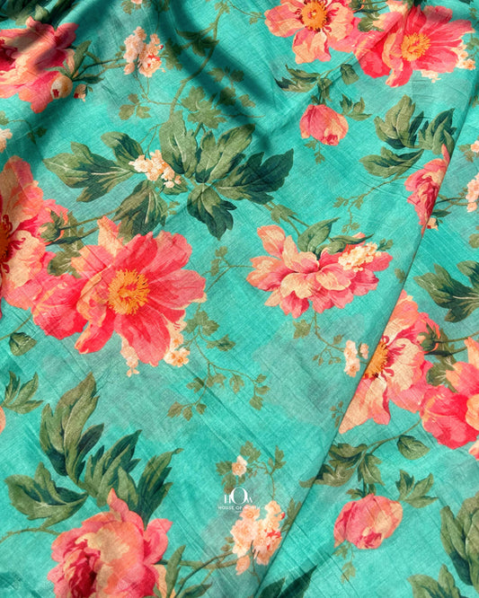 Bold floral printed Mul Chanderi fabric – soft and breathable handloom textile for suits and sarees.