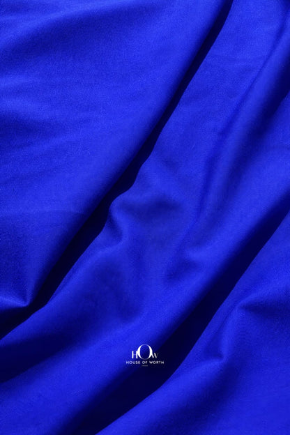 Royal blue imported banana crepe fabric with smooth finish for gowns, skirts and party wear