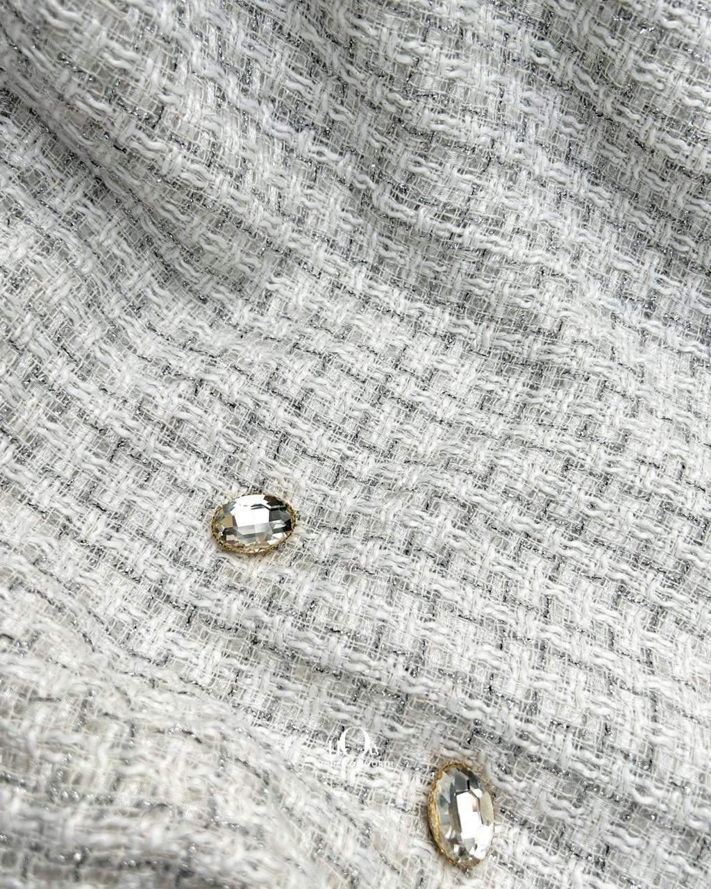 Imported tweed blazer fabric.