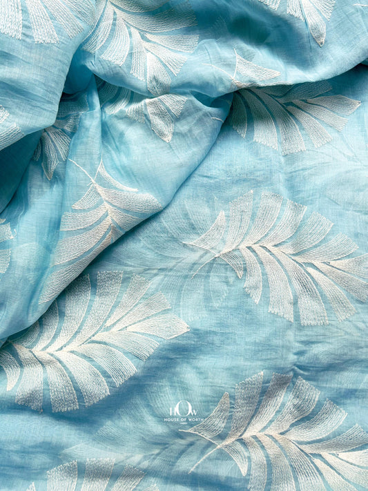 Sky blue Pure Mul Chanderi fabric with crinkled texture – ideal for flowy sarees, dupattas, and ethnic fusion wear.