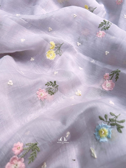 Lavender Pure Mul Chanderi fabric with colorful floral butti embroidery – ideal for kurtis, sarees, and dupattas.