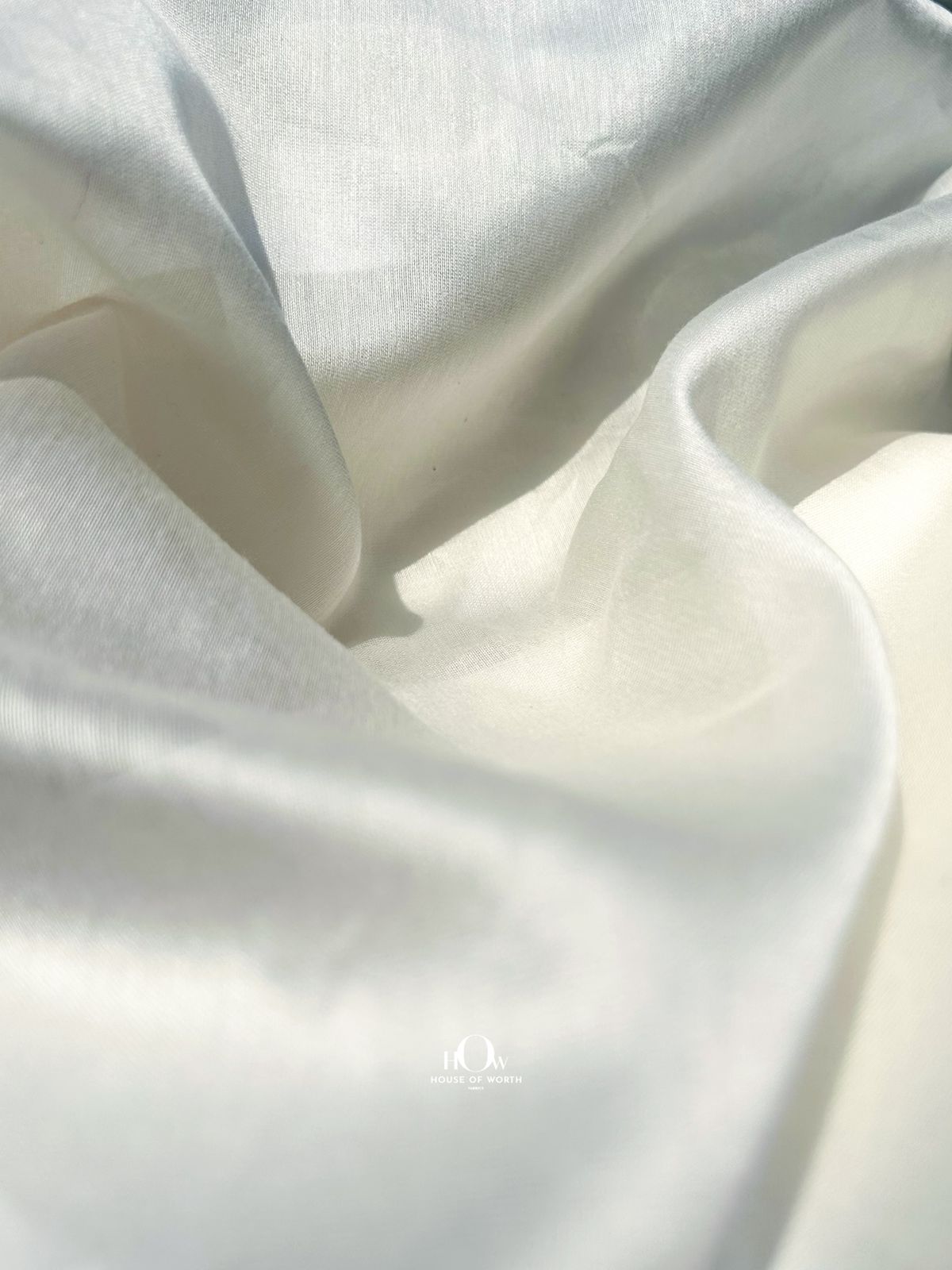 High-density 70 gram dyeable Mul Chanderi fabric – used in ethnic tailoring, available with suppliers in Banaras and Varanasi. Heavyweight mul chanderi.
