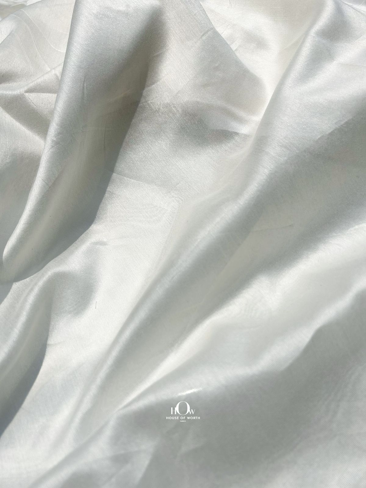 Wholesale 70 gram Mul Chanderi fabric – plain dyeable texture suitable for sarees, salwar suits, and luxury pret collections.