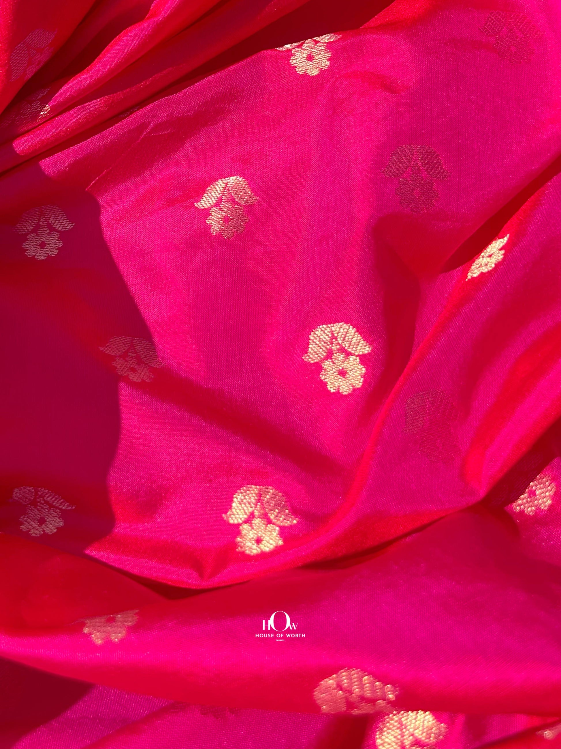 Festive Banarasi silk lehenga from Varanasi in bright red, ideal for weddings & festivals.