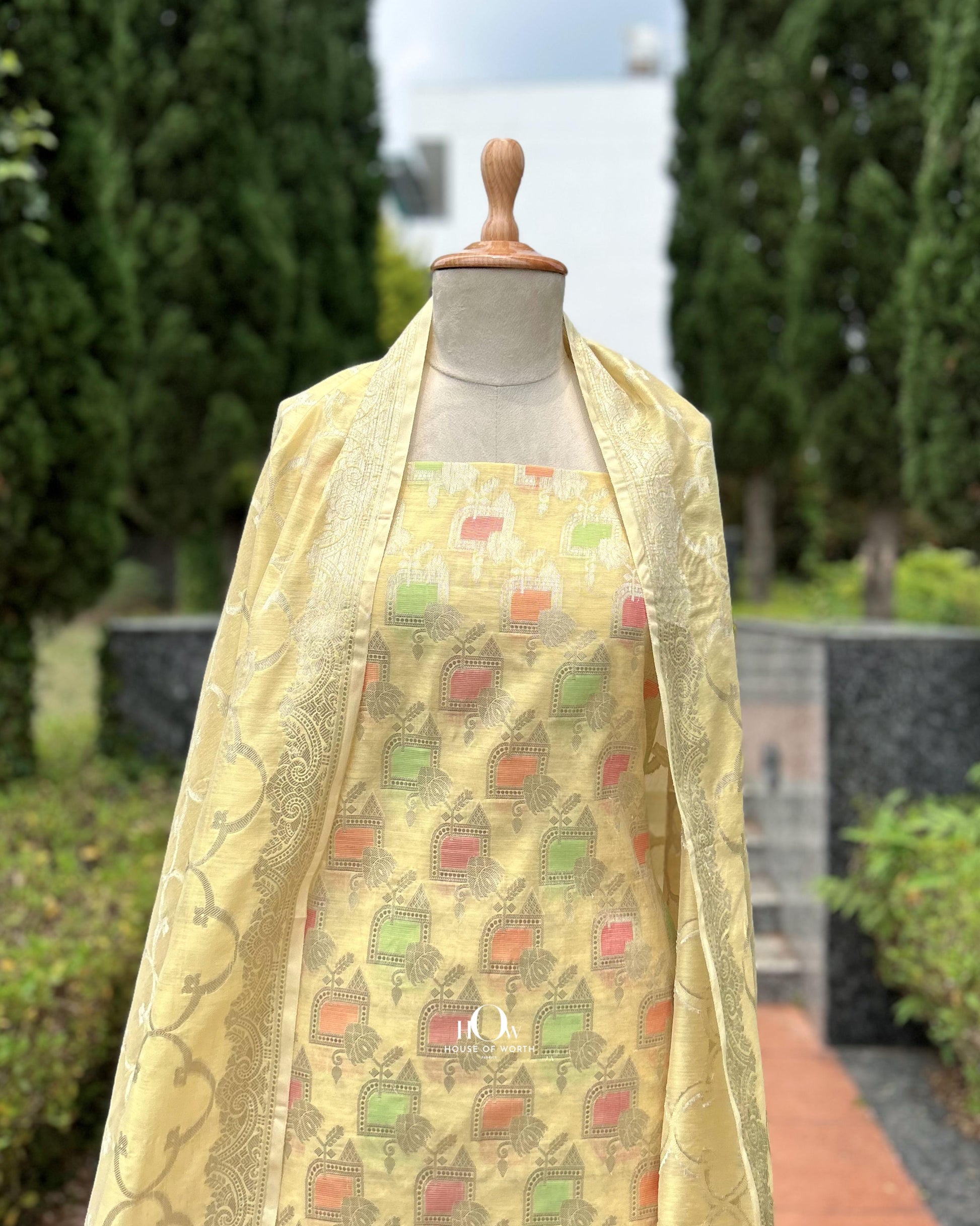 Elegant unstitched suit set in Banarasi cotton with pastel and silver tones