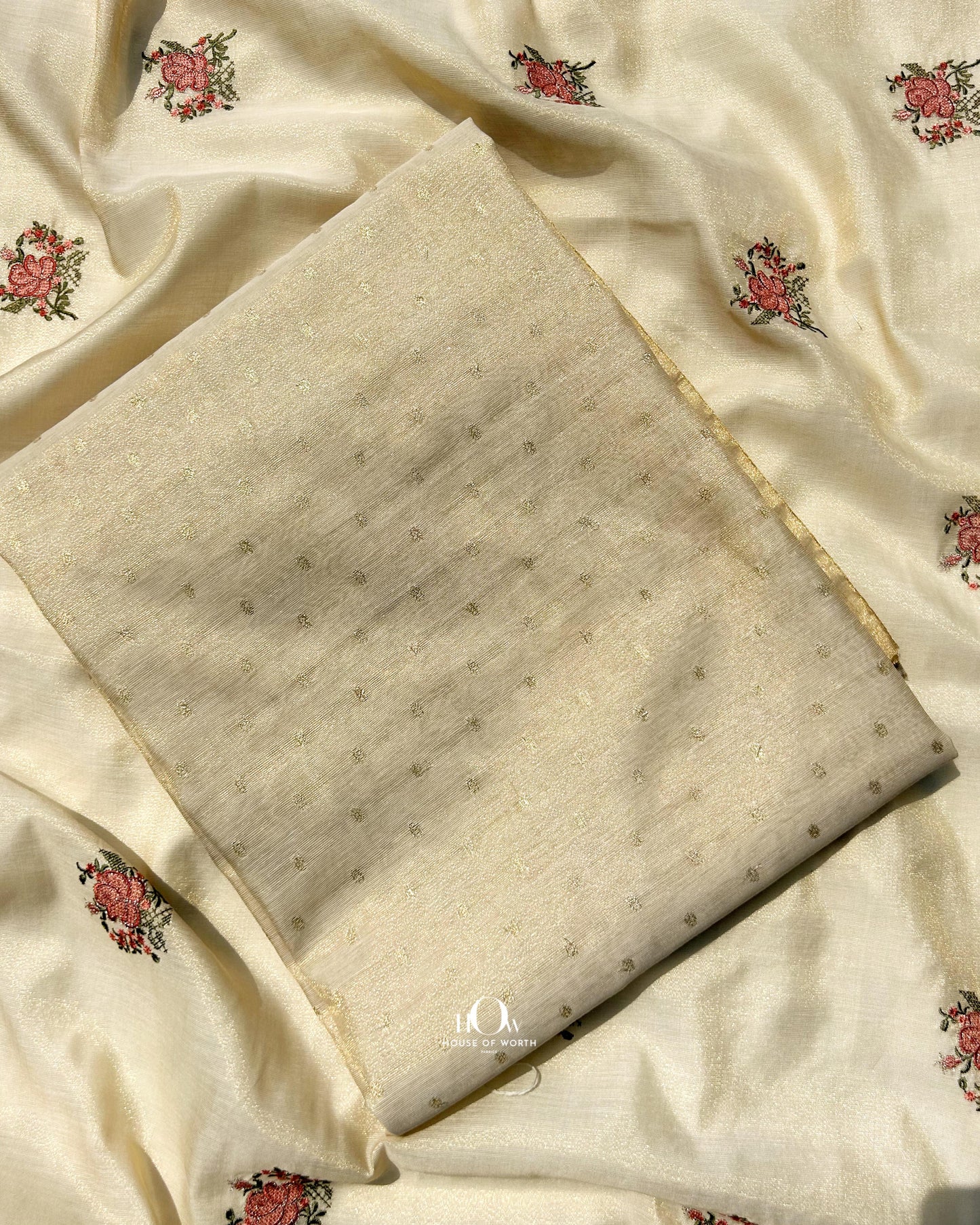 Lightweight unstitched Banarasi cotton-tissue suit in pastel shade and colours.