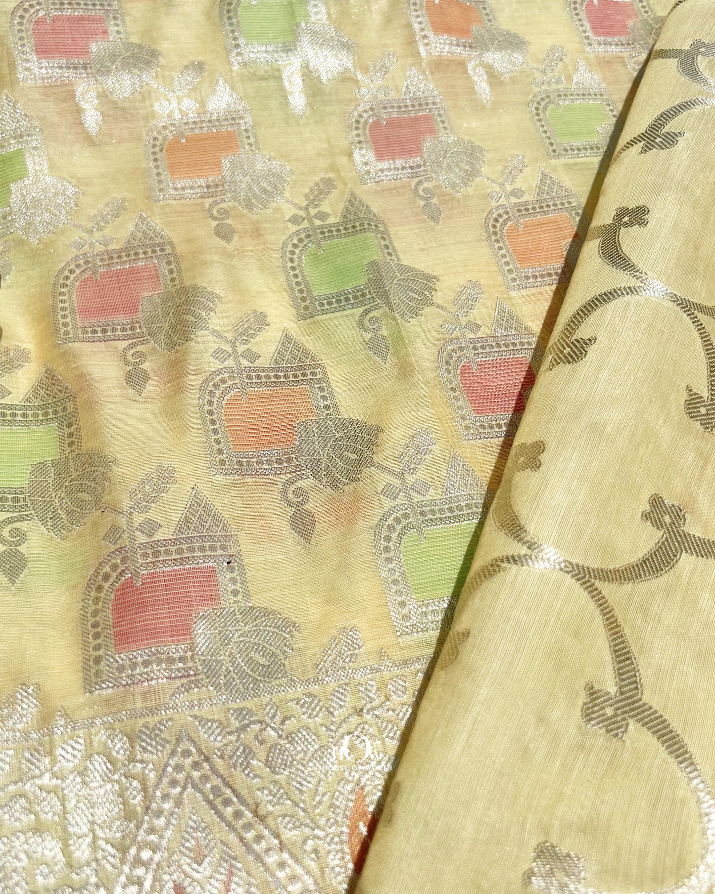 Soft cotton festive suit with multicolour zari and motifs and dupatta.