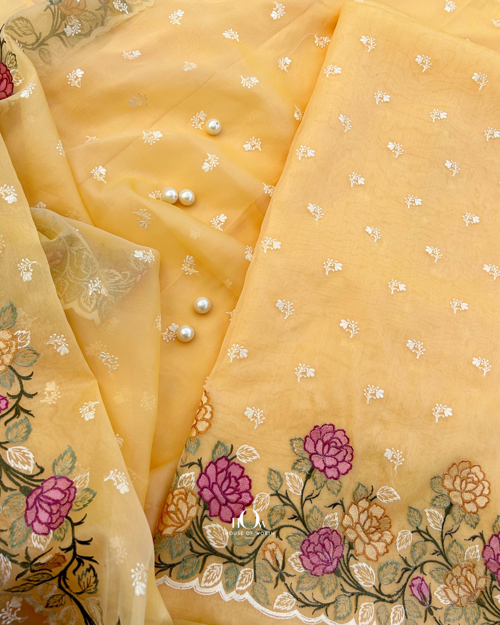 Unstitched organza kora silk suit set ideal for festive wear. Organza suit for summers.
