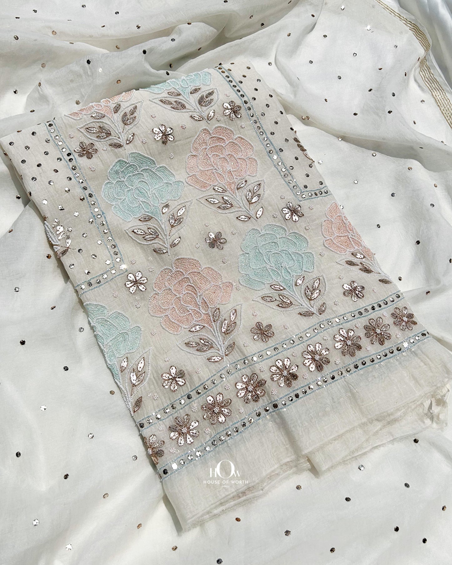 Mul Chanderi top dupatta set with chikankari and gota detailing.