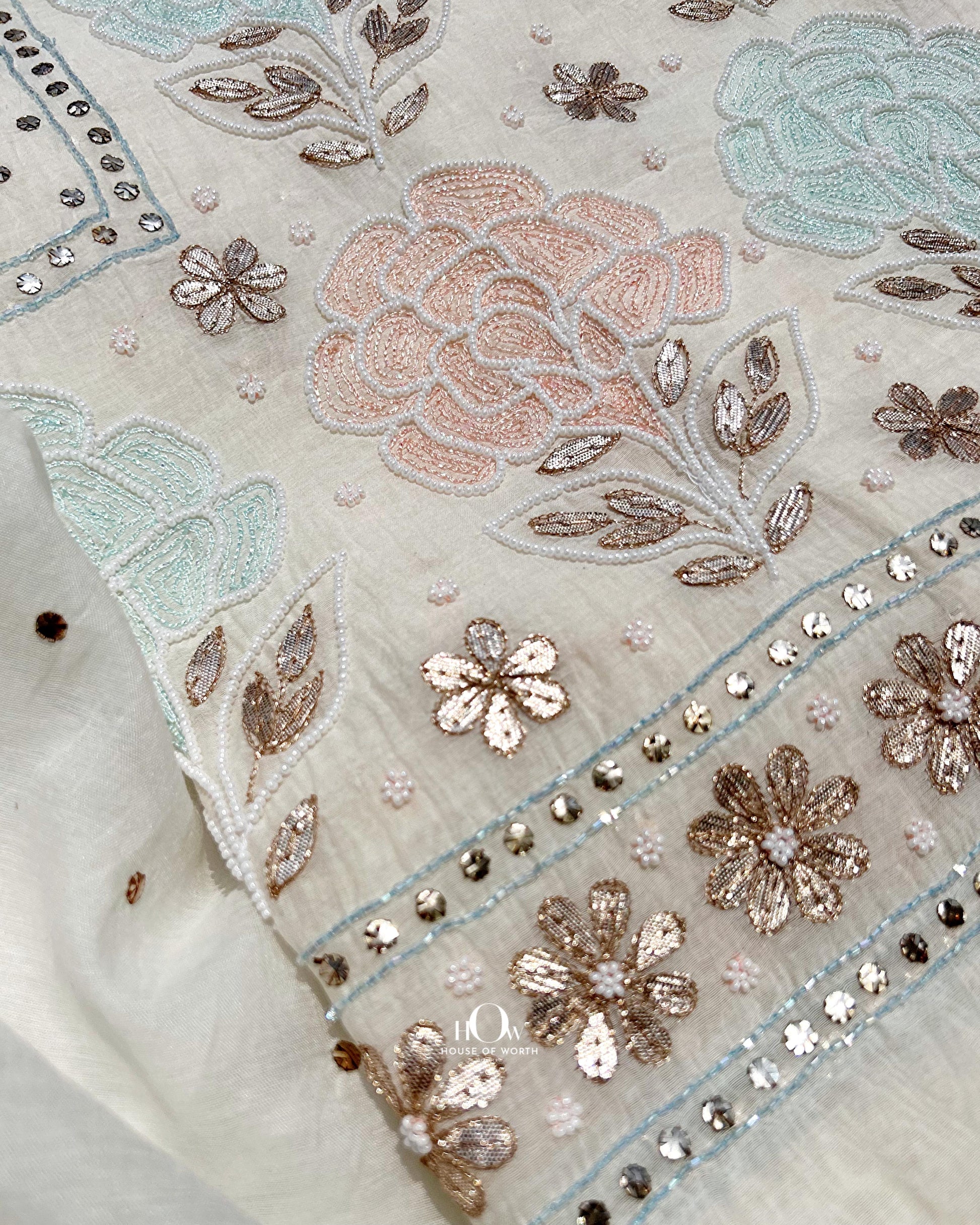 Off white Mul Chanderi chikankari kurta with pearl and mukaish work.