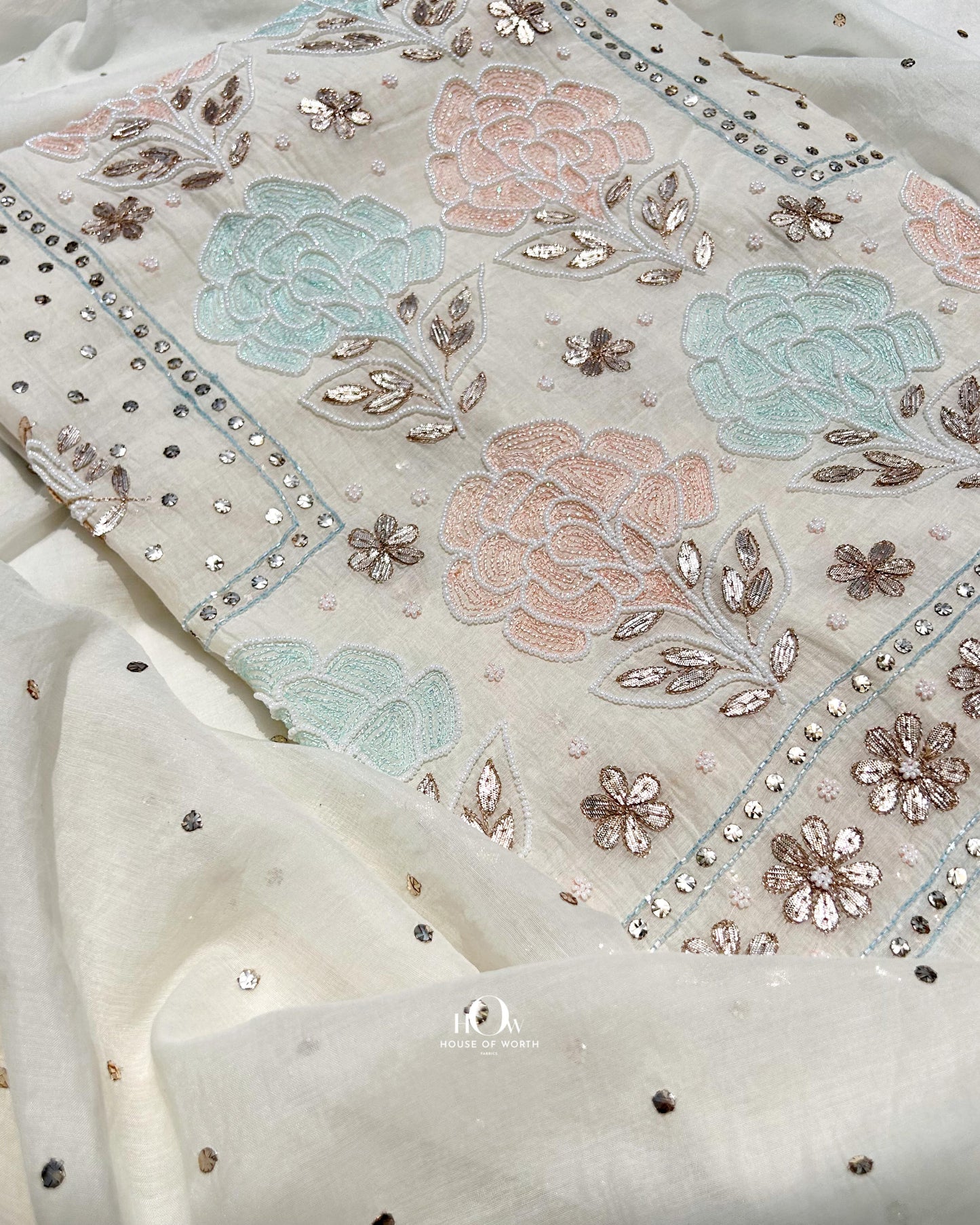 Lucknow chikankari suit top in Mul Chanderi fabric.